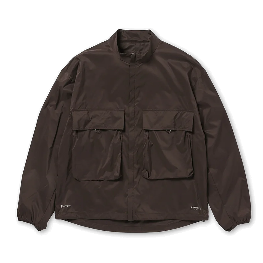 Front view of a dark brown Snow Peak Pertex Quantum Air Jacket, laid flat on white, showing the stand collar, concealed front placket, two large chest flap pockets, elastic cuffs and a curved hem.