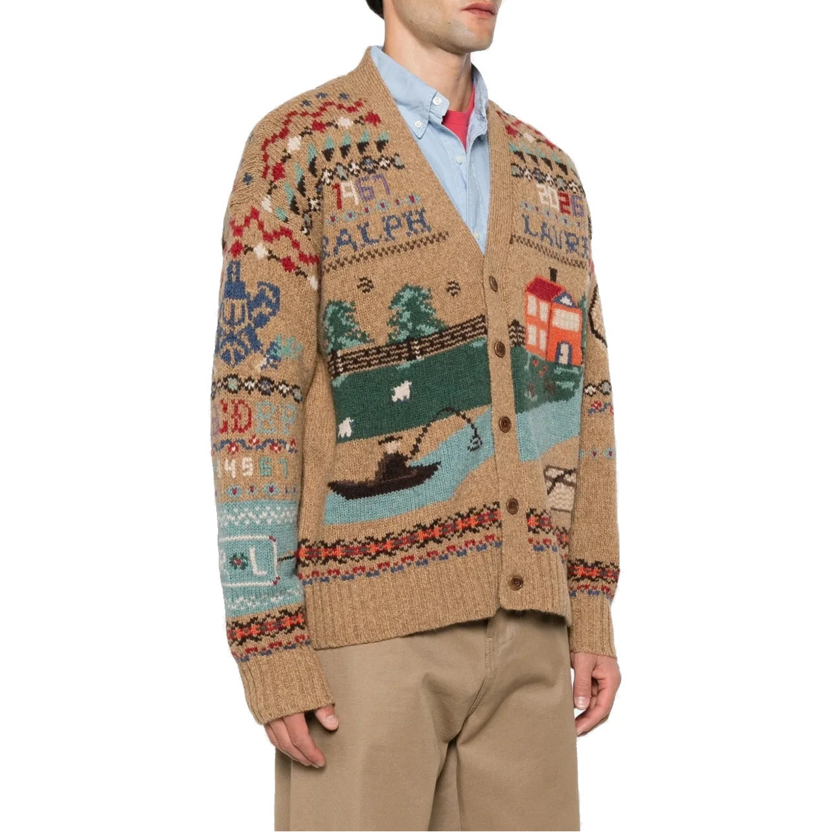 A model wears the Scenic Wool Cardigan buttoned over a light blue oxford shirt with khaki pants, seen from a three-quarter angle.