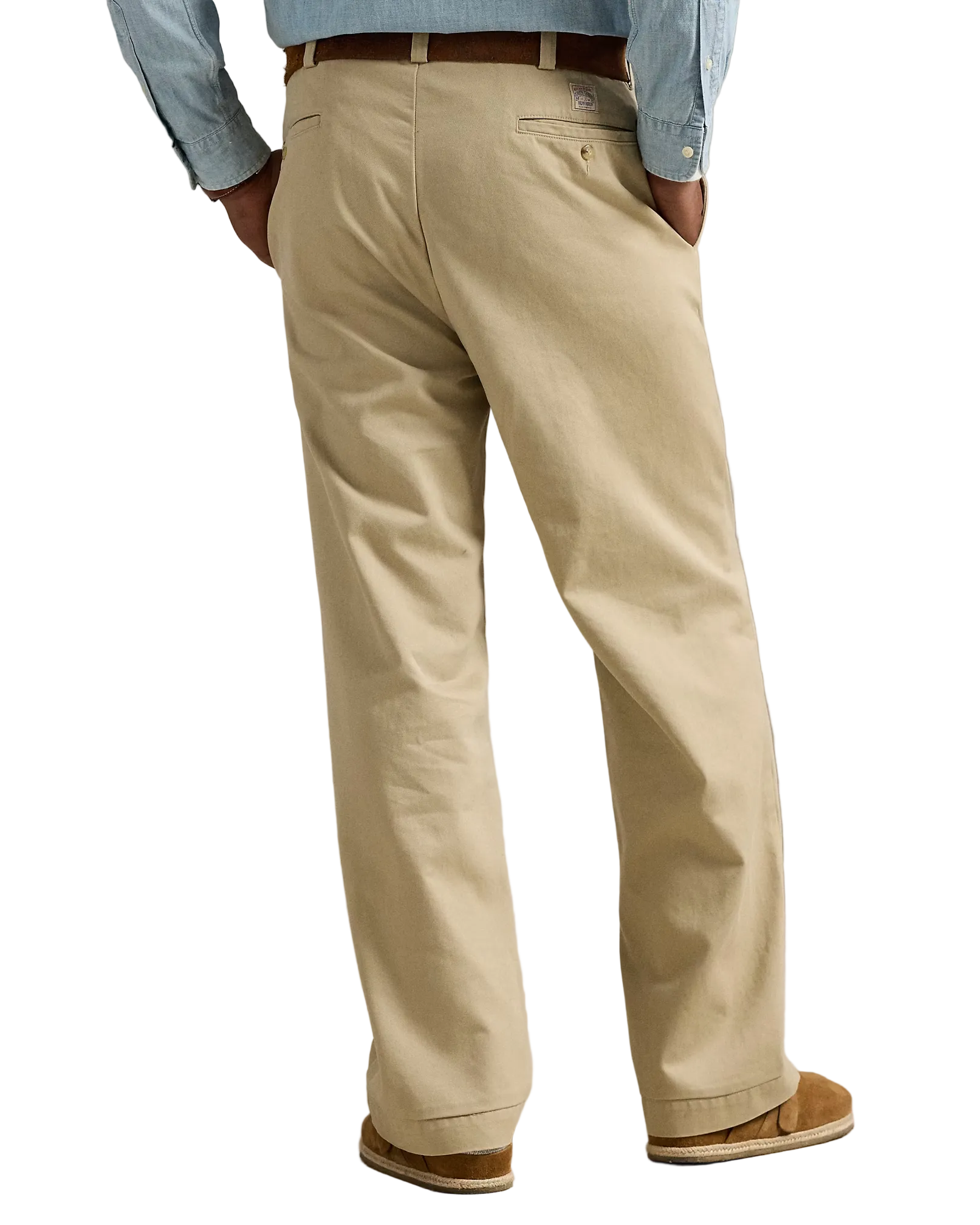 Beige pants worn by a person on a neutral background