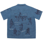 Blue shirt with black embroidered designs on a white background