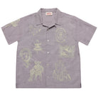 Lavender shirt with green graphic designs on a white background