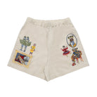 Beige shorts with colorful embroidered designs on a white background