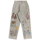 Beige pants with colorful embroidered designs on a white background