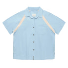 Light blue shirt with beige accents on a white background