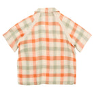 Plaid shirt with orange and green pattern on a white background