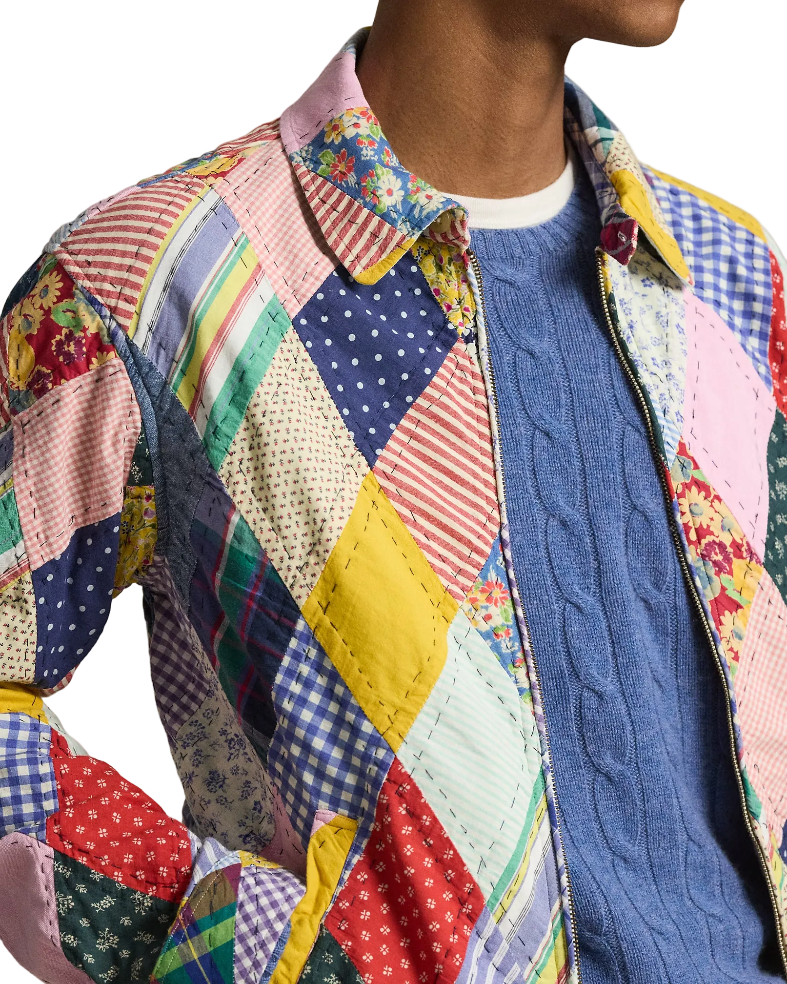 Multicolored patchwork jacket worn by a person