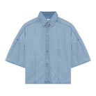Light blue denim shirt on a white background
