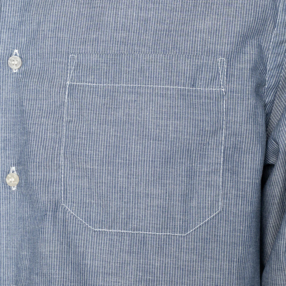 Close-up of a blue striped shirt with a pocket