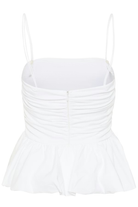 White top with thin straps on a white background