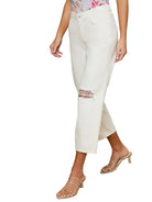 Person wearing white pants on a white background