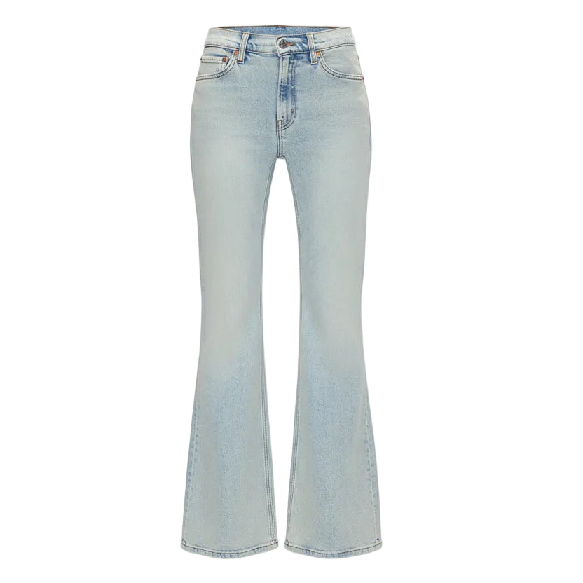 Light blue flared jeans on a white background