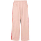 Pink pants with a red stripe on a white background