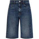 Blue denim shorts on a white background