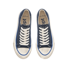 Pair of blue sneakers with white laces on a white background