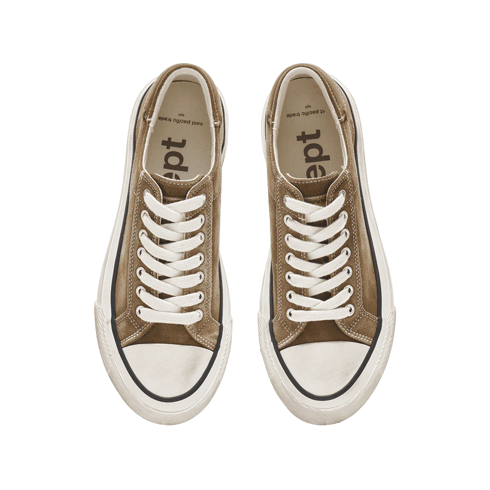 Pair of brown sneakers with white laces on a white background