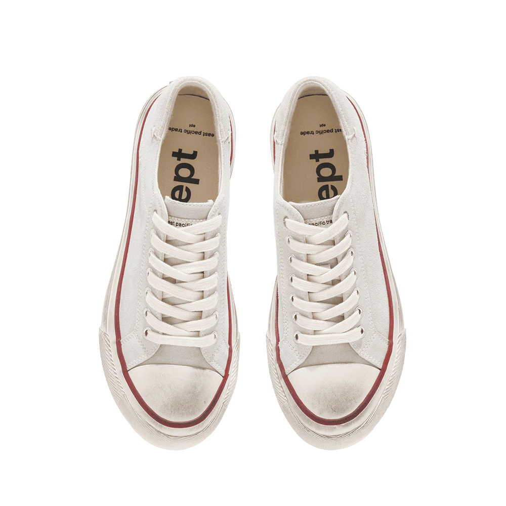 White sneakers with red accents on a transparent background