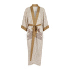 Beige and brown patterned robe on a white background