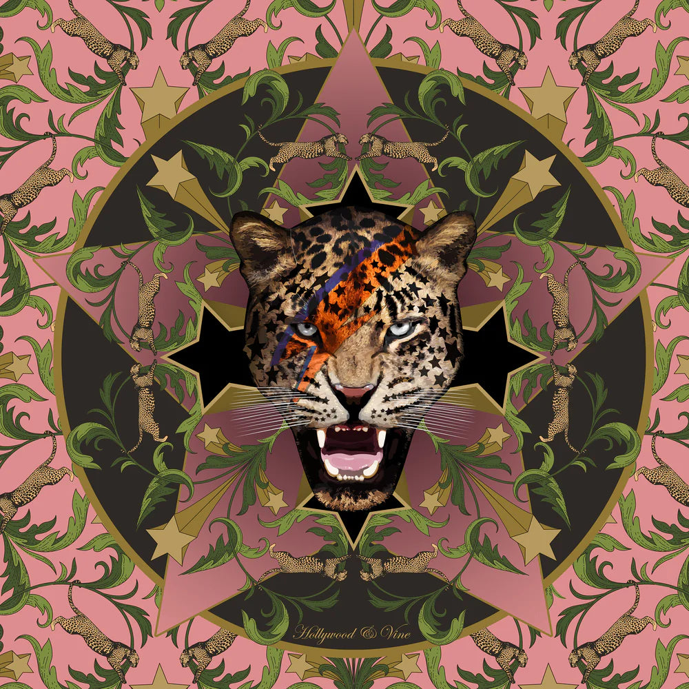 Leopard head in a decorative frame with a pink and green pattern