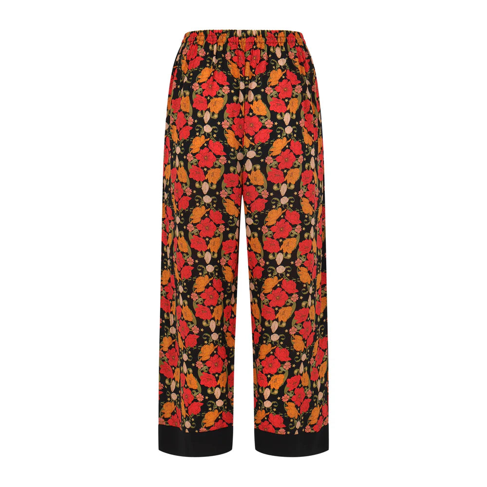 Floral patterned pants on a white background