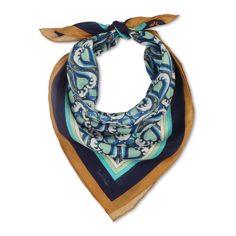 Colorful patterned scarf with a brown border on a white background