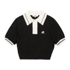 Black polo shirt with white collar and logo on a white background