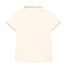Back of an ivory polo on a white background