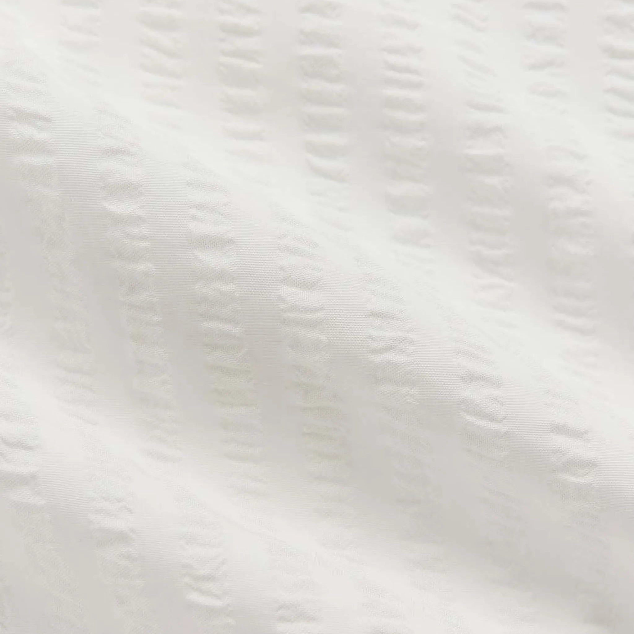Close-up of a textured white surface