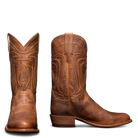 Brown cowboy boots on a white background