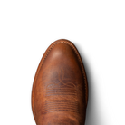 top view of brown cowboy boots on a white background