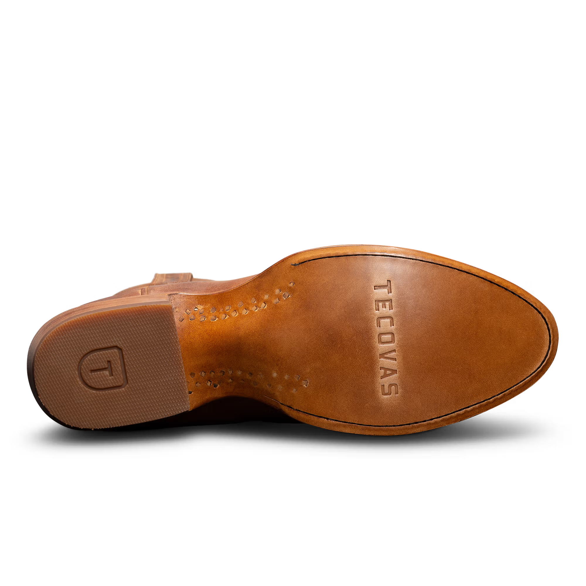 Sole of brown cowboy boots on a white background