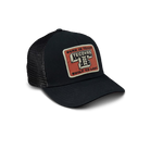 Black trucker cap with a red and beige patch on a white background