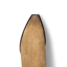 Tan cowboy boot with detailed sole on a white background