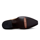 Brown leather shoe with 'Tecovas' branding on a white background