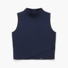 Sleeveless mock neck top on a white background