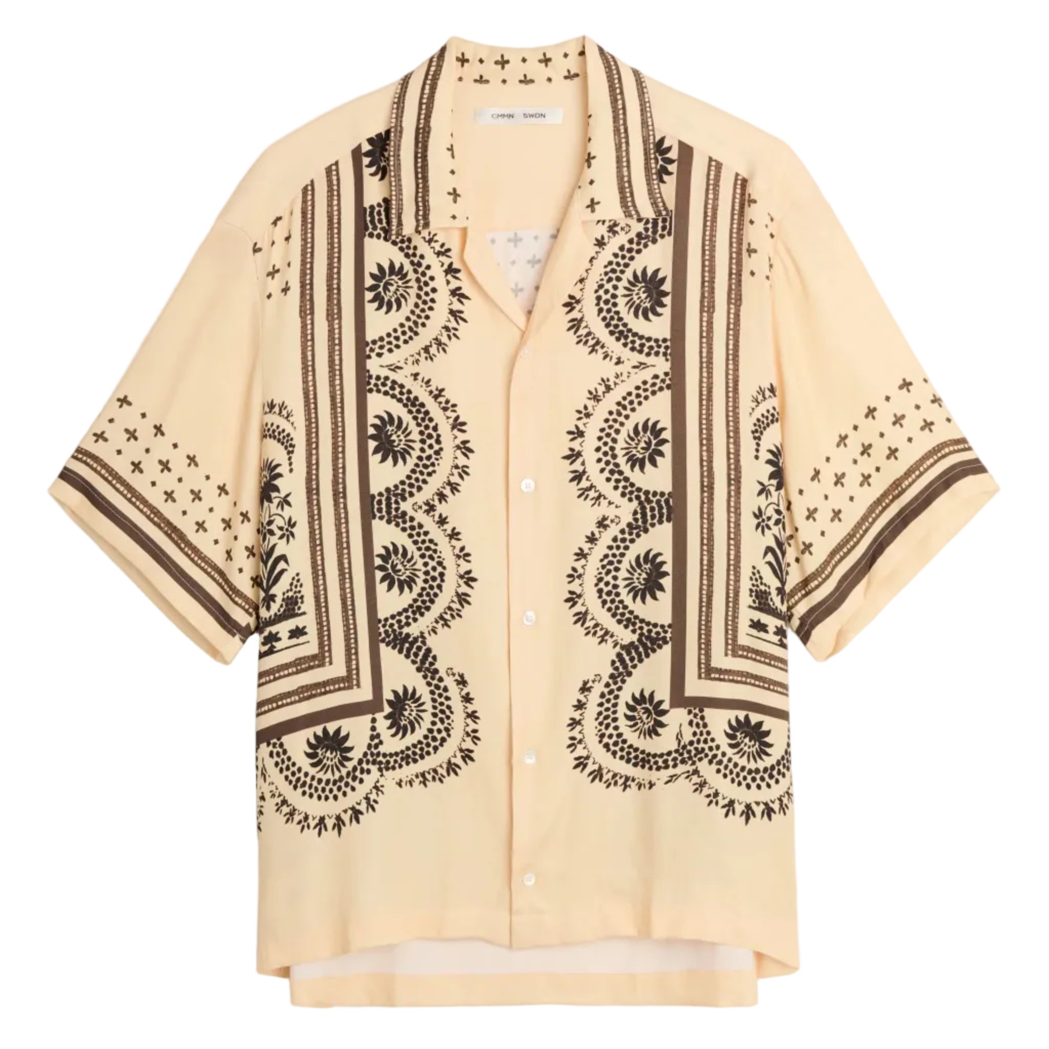 Beige shirt with black print on a light white background