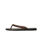 Brown sandal with brown beaded strap on a white background