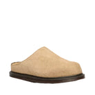 Tan mules on a white background
