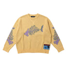 Yellow sweater with fishbone designs on sleeves against a white background