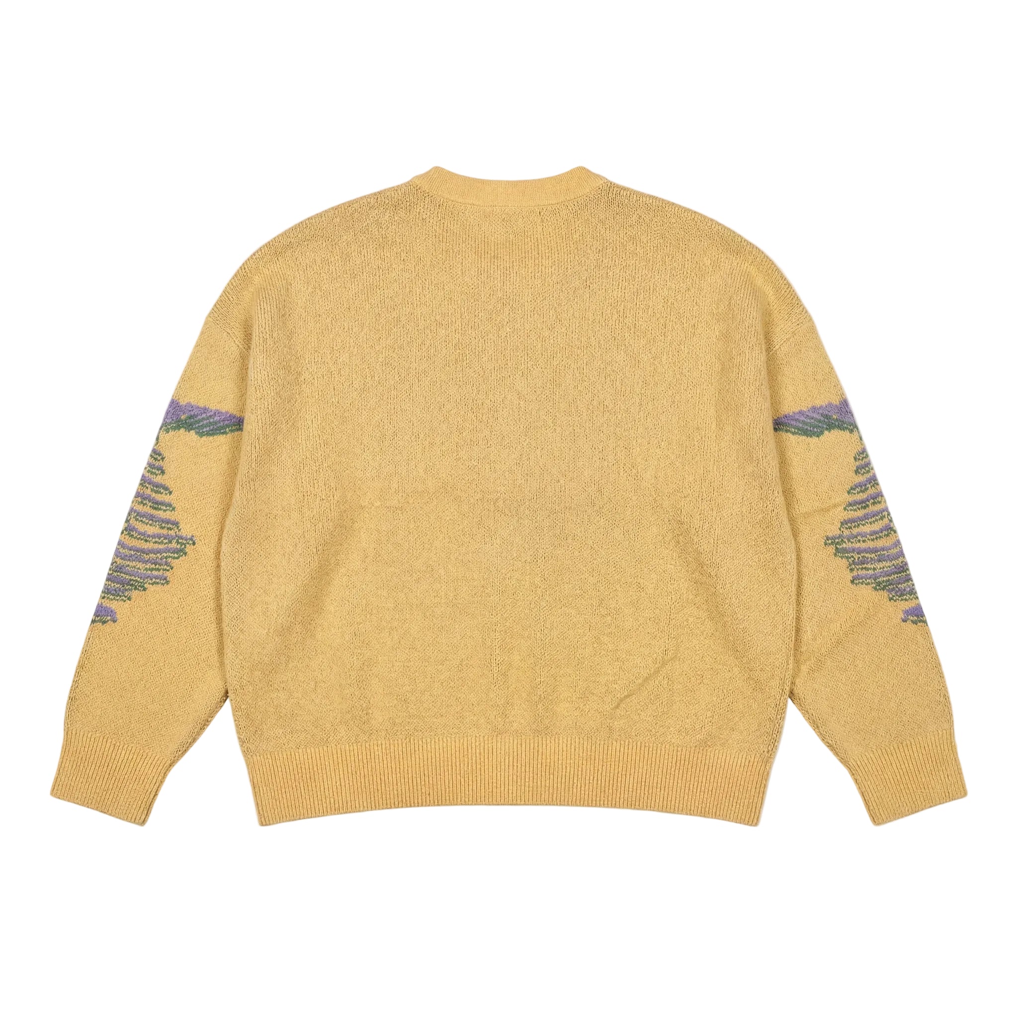 Yellow sweater with patterned sleeves on a white background