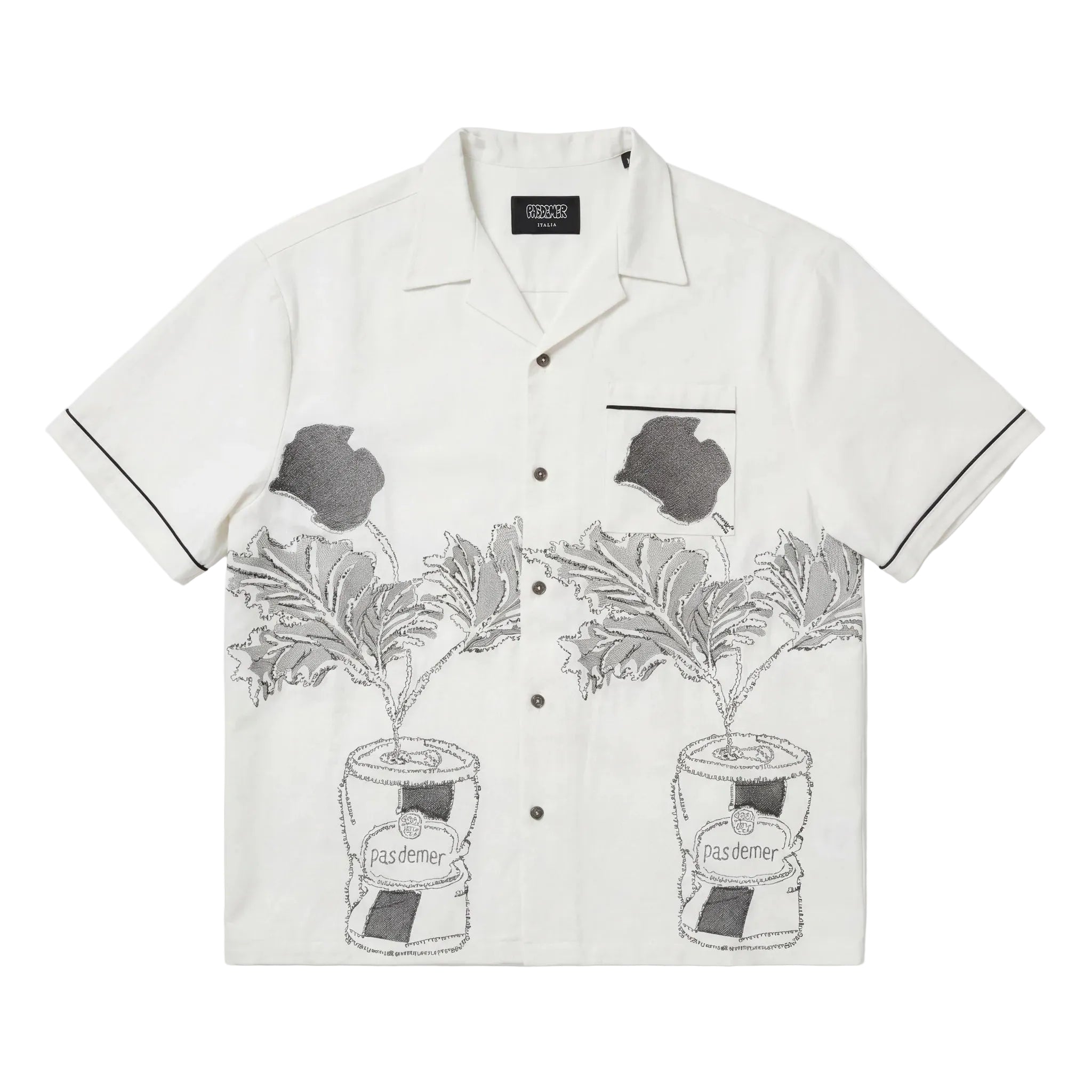White shirt with black floral patterns on a white background