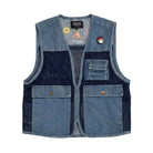 Blue denim vest with patches on a white background