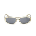 Sunglasses with a clear frame and dark lenses on a white background