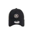Black cap with white mesh and logo on a white background