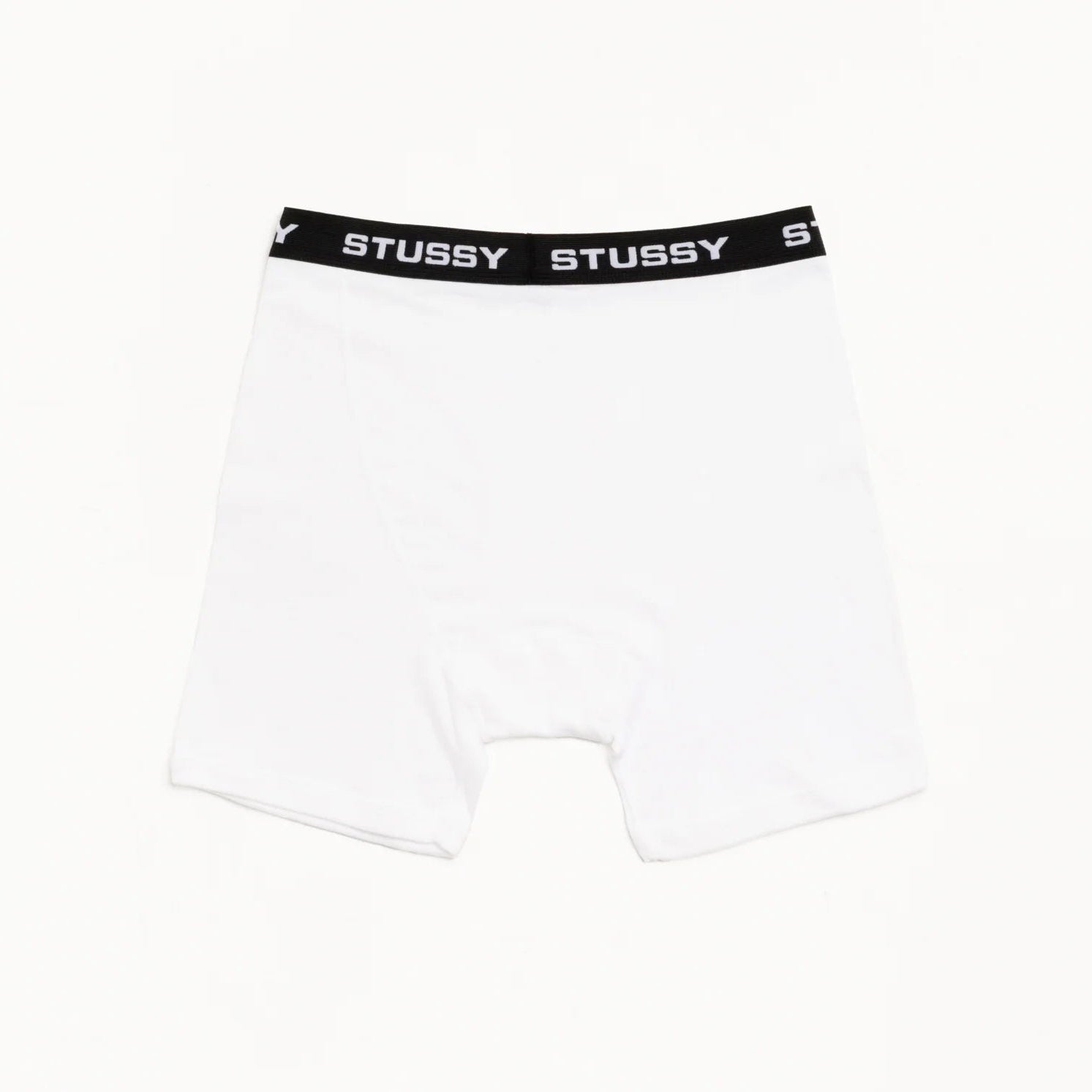 White boxer briefs with a black Stussy waistband on a white background