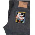 Folded blue jeans on a white background
