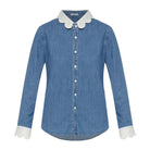 A blue denim long-sleeve button-up shirt with contrasting white scalloped Peter Pan collar and cuffs, shown against a plain white background.