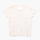 A short-sleeve crewneck t-shirt in a very pale cream or off-white color, laid flat against a clean white background.