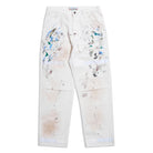 White pants with colorful abstract designs on a white background