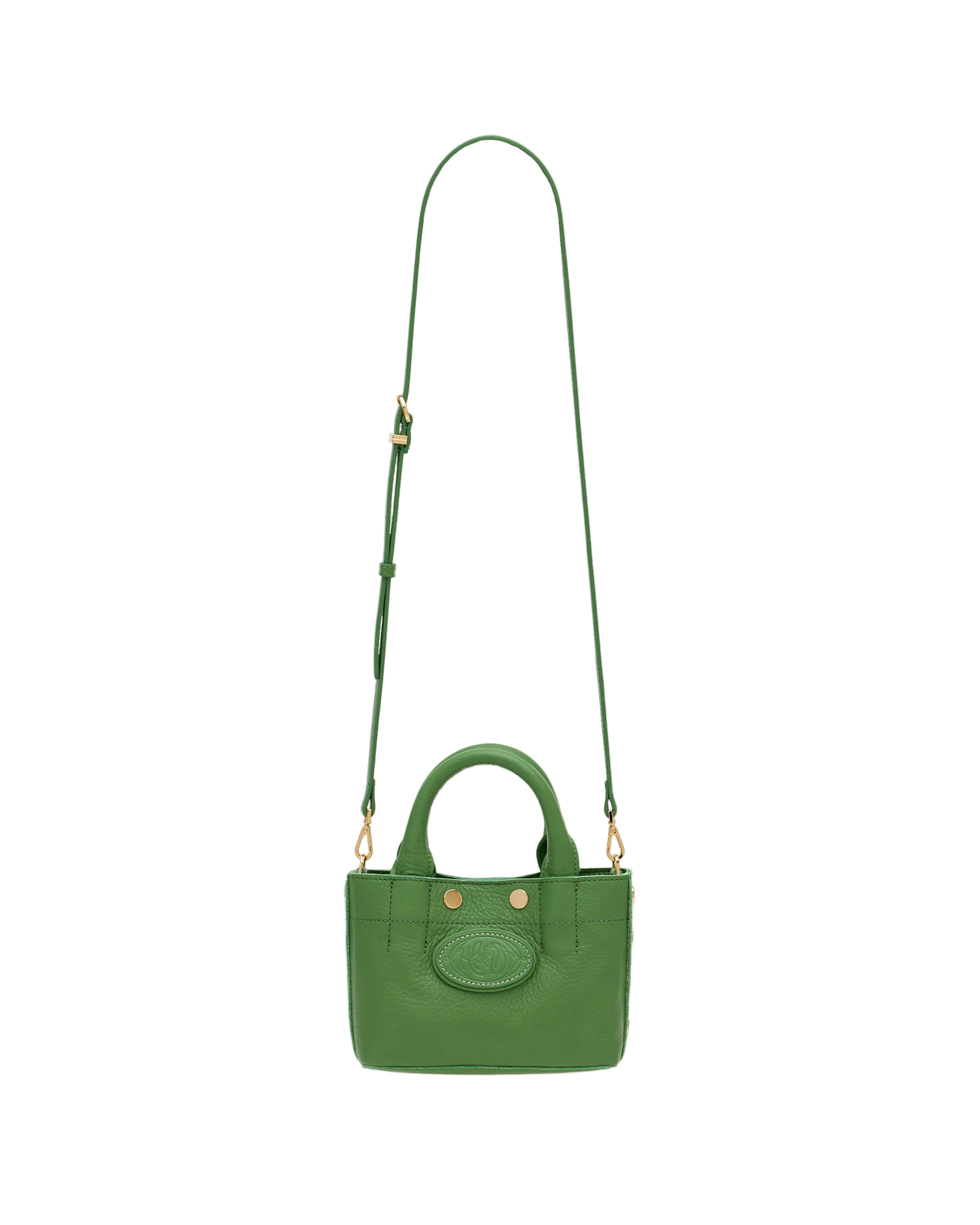 Green mini convertible tote bag with gold accents on a white background