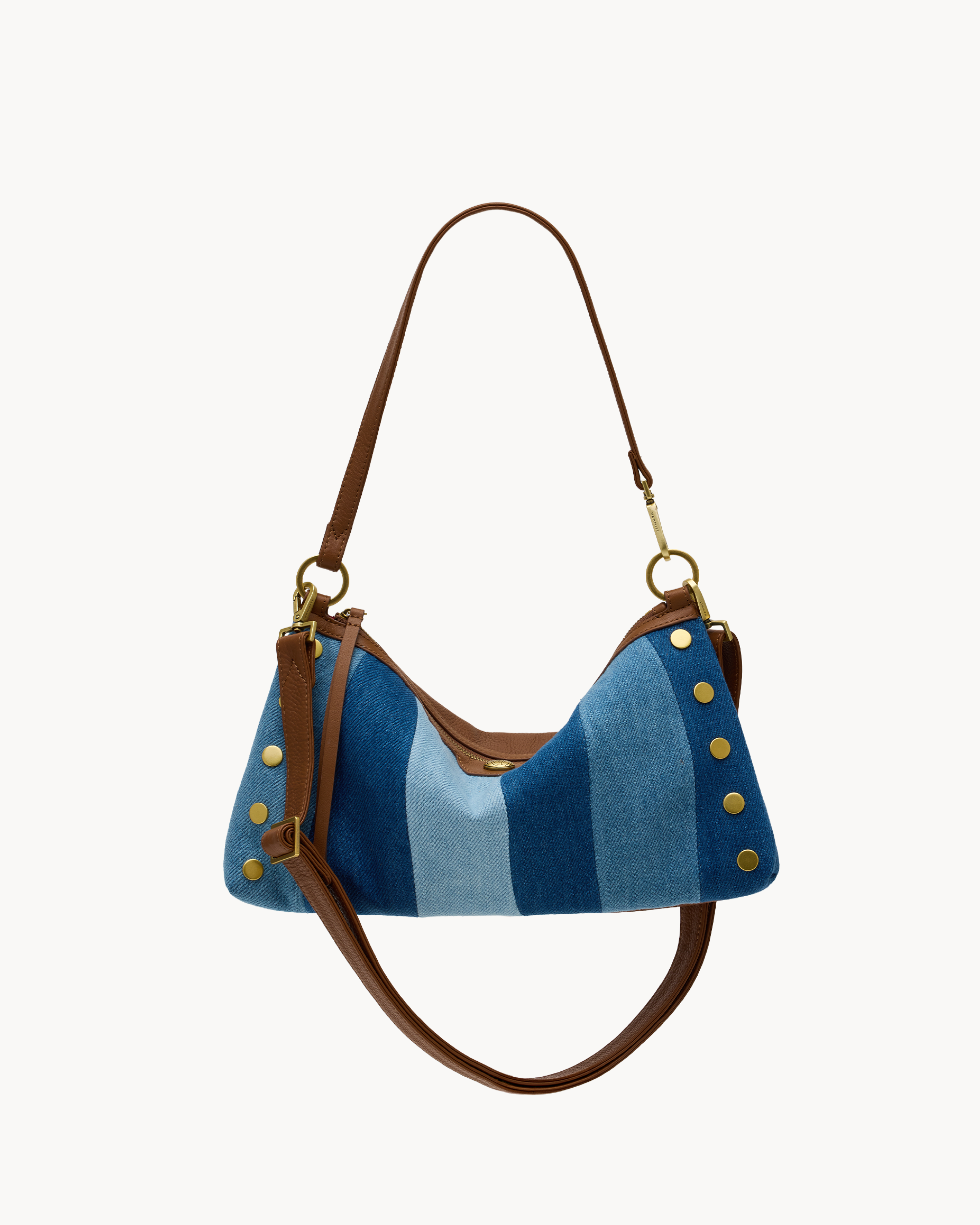 Blue striped convertible bag with brown and gold accents